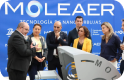 Moleaer at news conference for Spain office